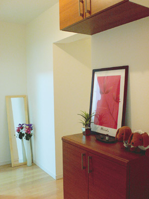 インテリアが楽しくなったとおっしゃる奥さまがコーディネートされた、かわいらしい印象の玄関