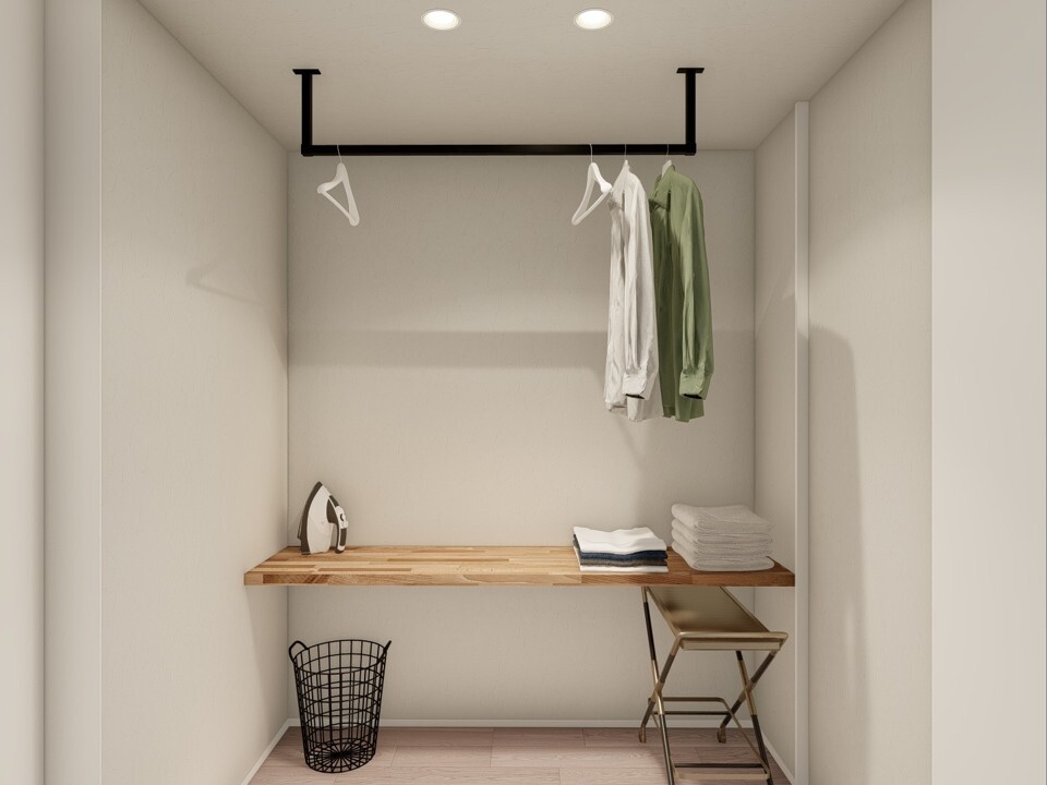リネン室衣類の整理がしやすいカウンターと、天井吊り下げ式物干し竿を備えたリネン室。洗う・干す・畳むが一か所で完結し、家事が驚くほどスムーズに。