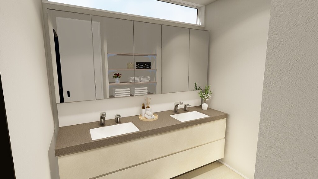 洗面所ゆったり使えるダブルボウル洗面台で、忙しい朝もスムーズ。収納も充実し、家族それぞれの生活リズムを心地よく支える空間です。